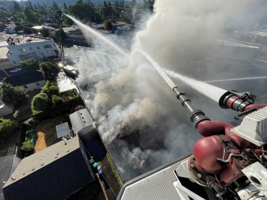 aerial_fire_streams_smoke_water_roseway_theater