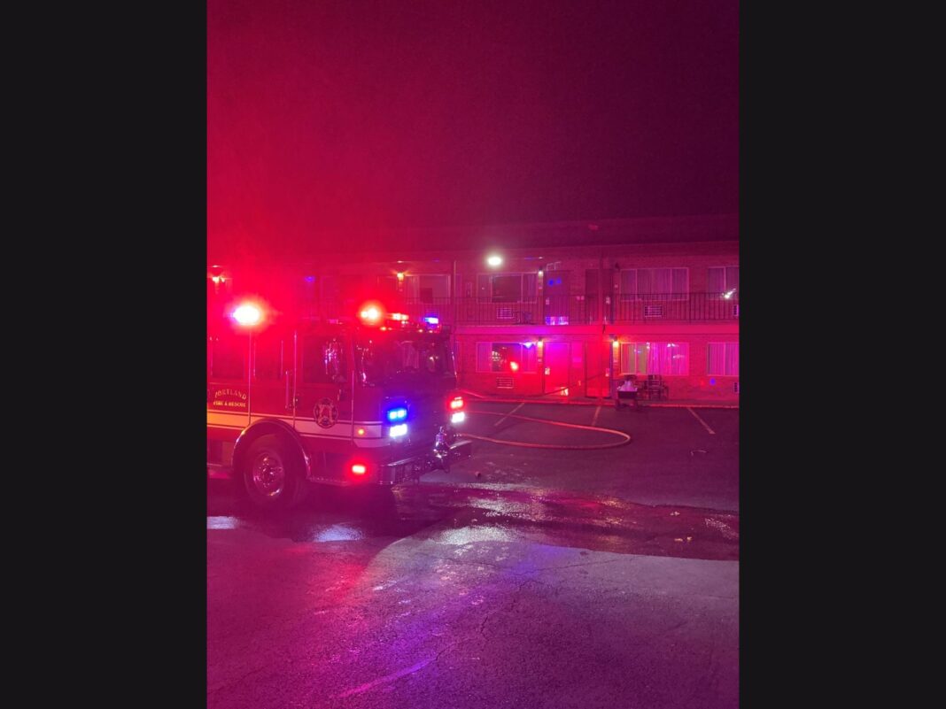 firetruck in front of former hotel