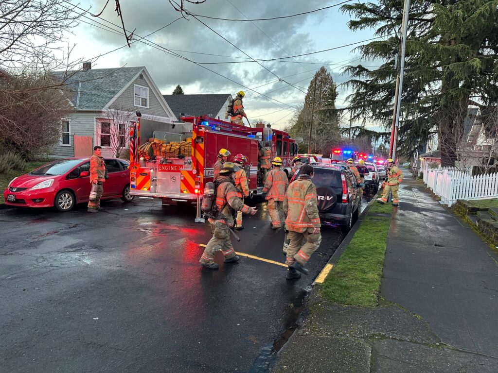 firefighters on the scene of the fire in piedmont neighborhood