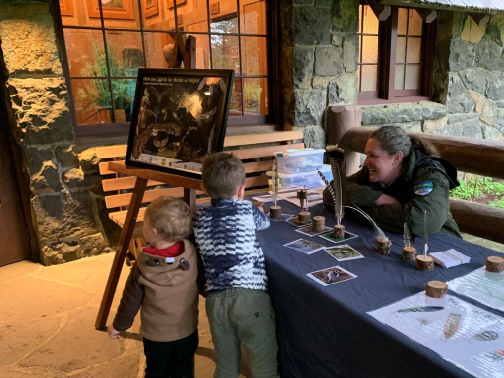 Park Staff talks to visiting children about wildflowers and birds