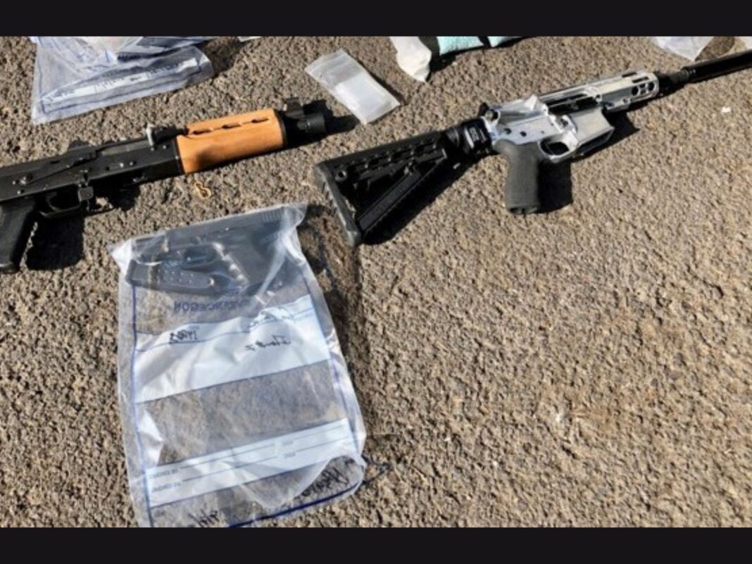 2 rifles pistol and fentanyl seized from suspect