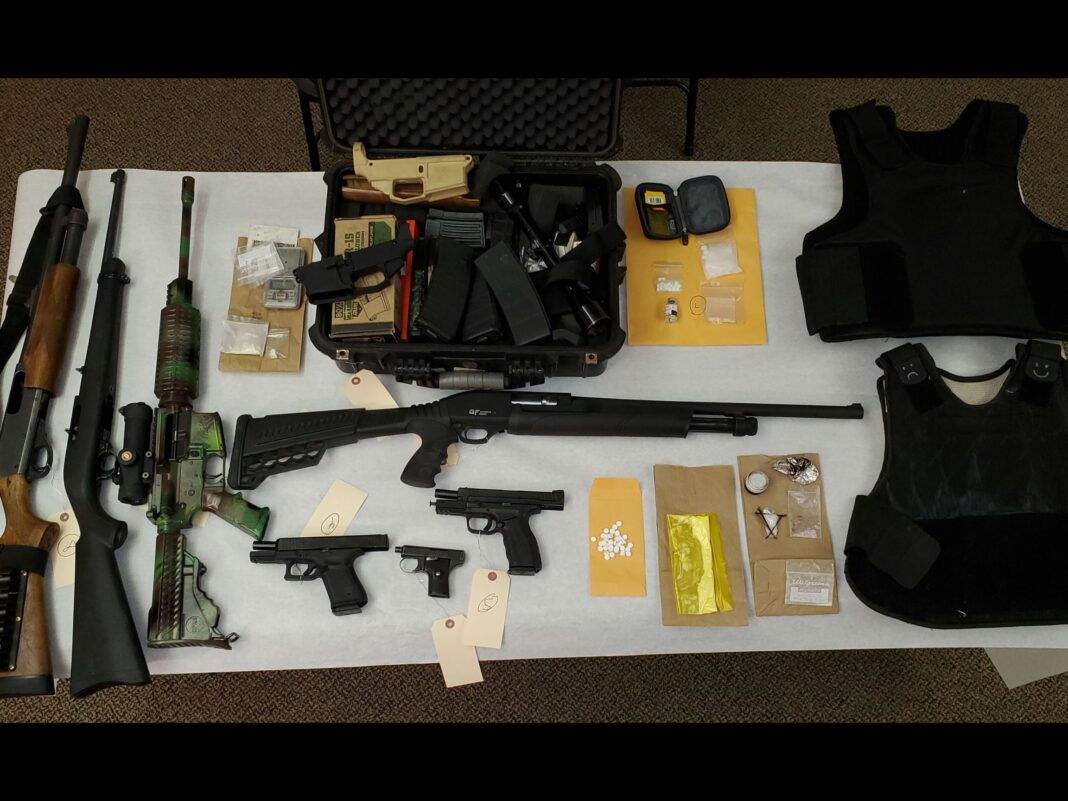 guns, drugs, body armor seized during arrest of Jesse Rigel