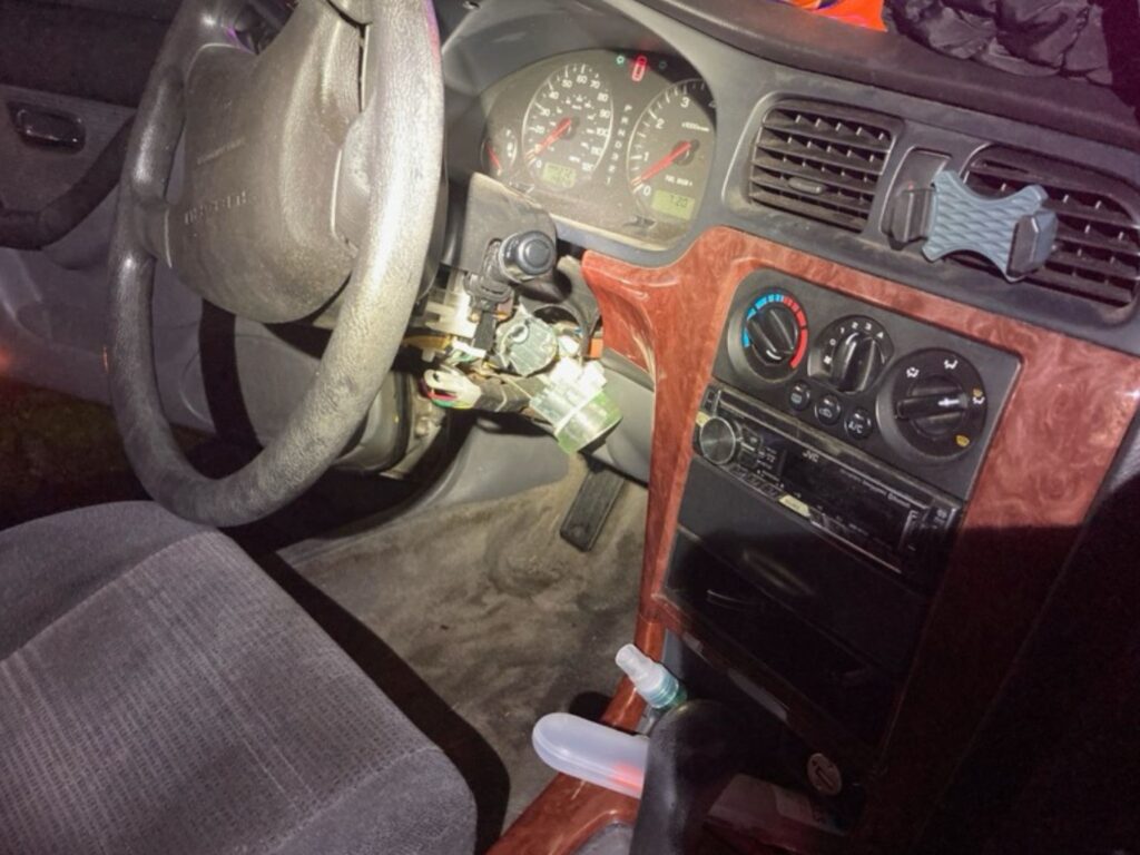 a strippedpunched ignition, indicating the car was likely stolen